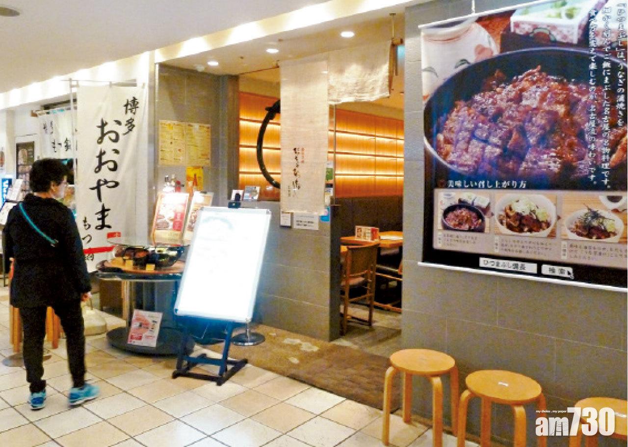 門外掛上了大幅宣傳海報,方便客人辨認。