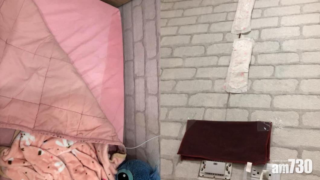 台女無奈下只能把M巾貼在墻上吸水,防止雨水滲入電箱。(FB圖片)