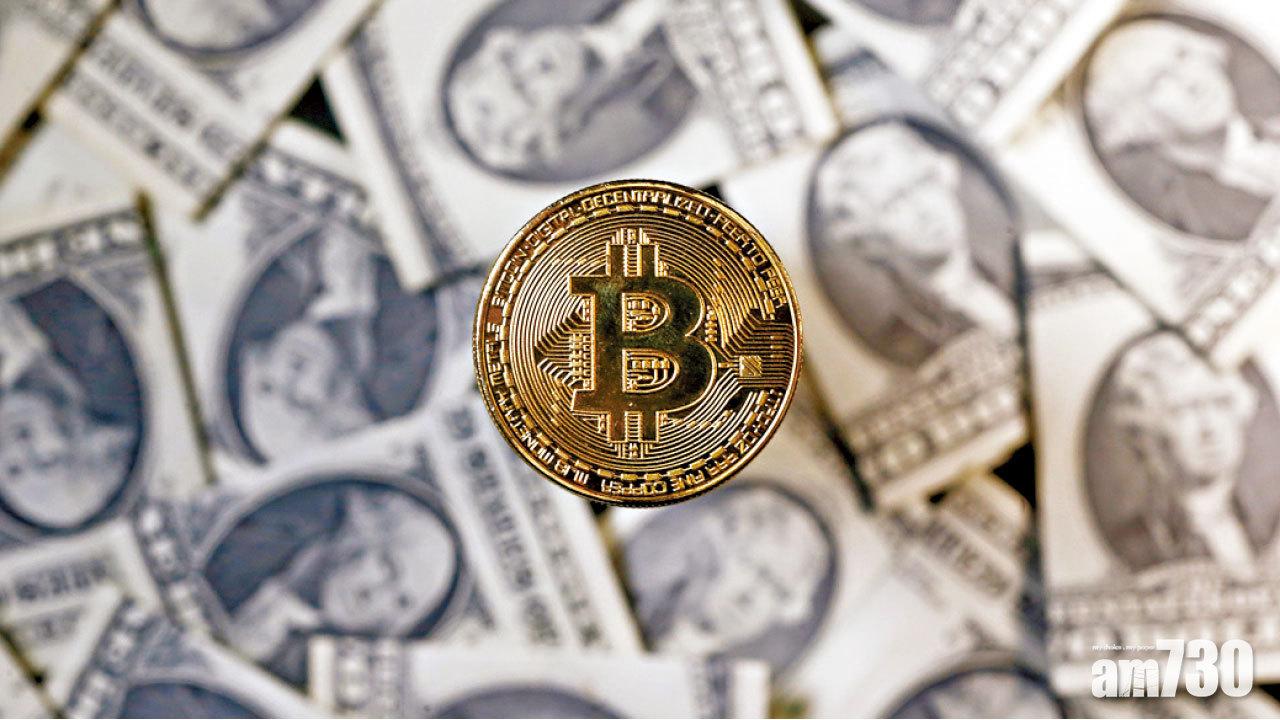 比特幣曾升破五萬七美元。(資料圖片)