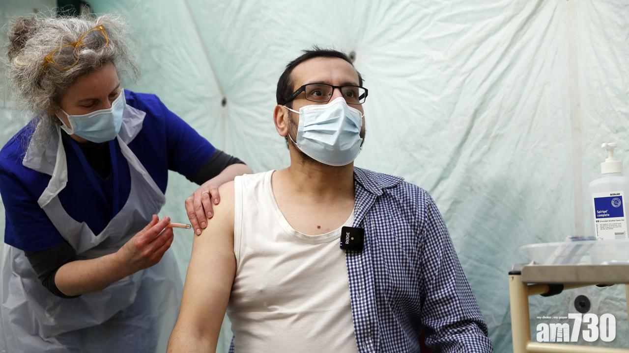英國接種首劑新冠疫苗人數突破2000萬,首度發現巴西變種病毒。(美聯社)