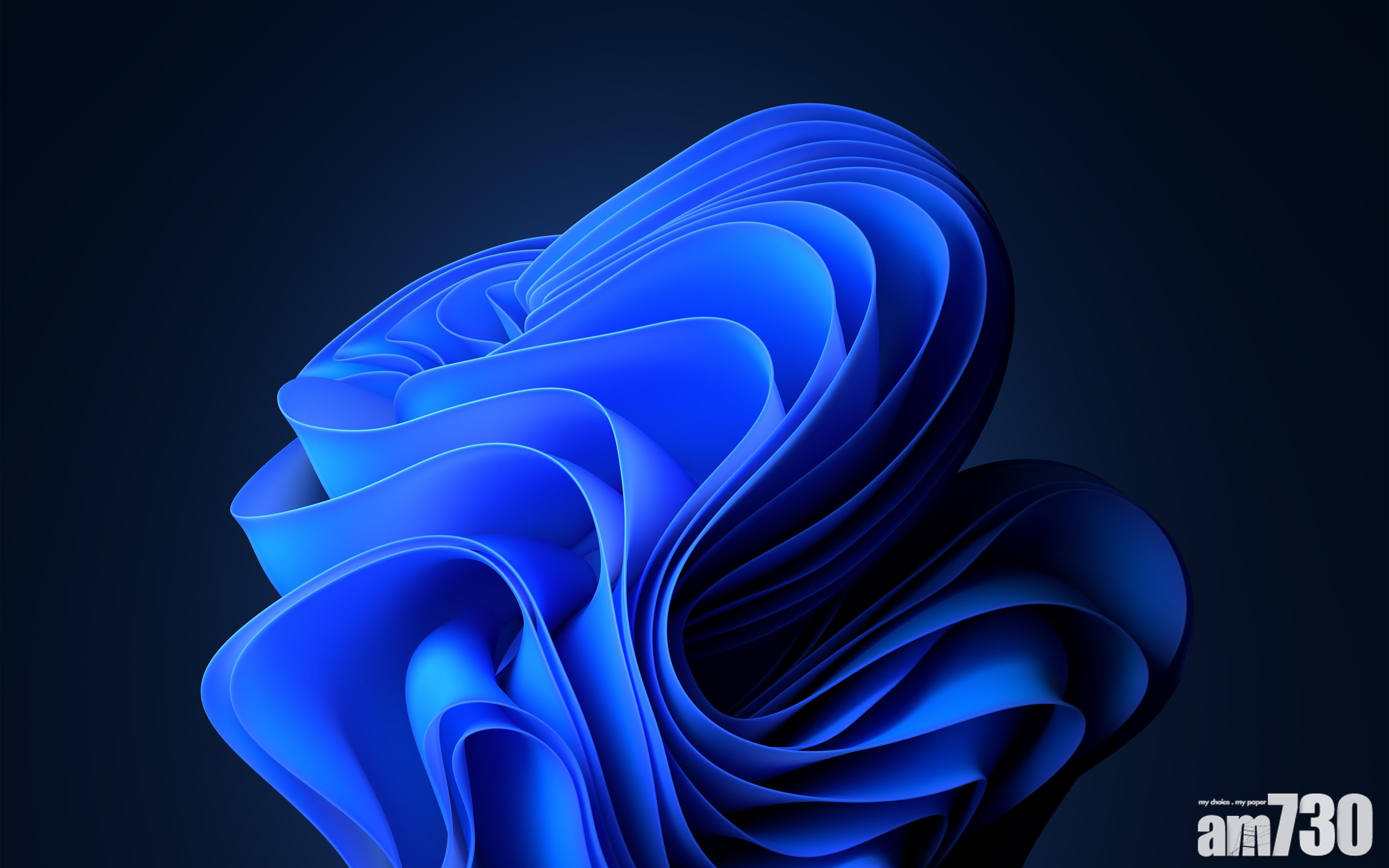 桌面有全新藍色捲曲的花作背景。