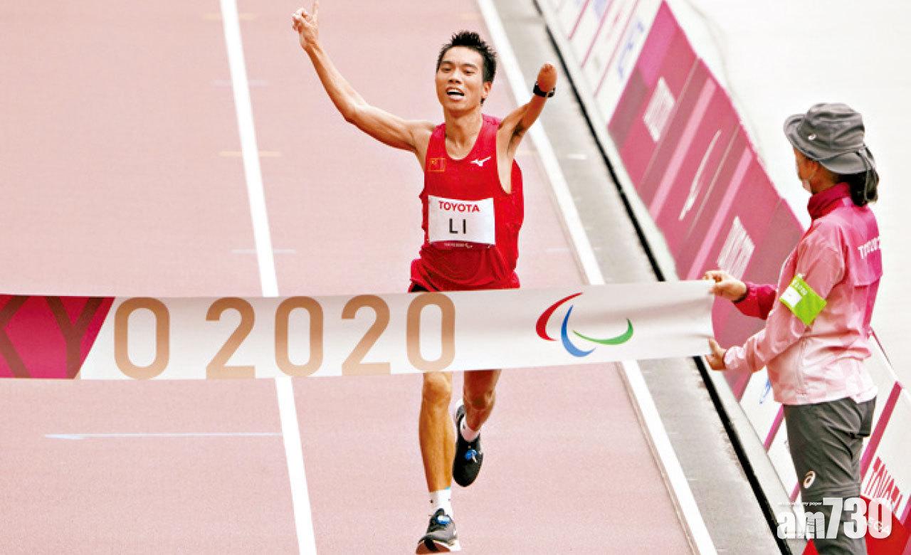中國選手李朝燕昨在男子馬拉松T46級賽事,衛冕金牌。
(美聯社)