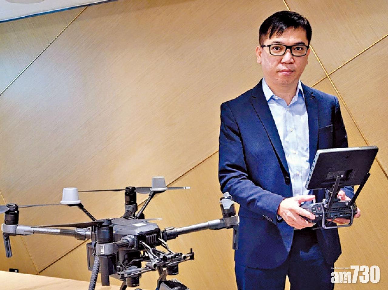 香港能源建設助理總經理-企業安全劉家樂展示UAS所用無人機。