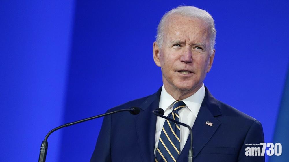 拜登為上屆政府退出《巴黎協定》致歉。(AP)