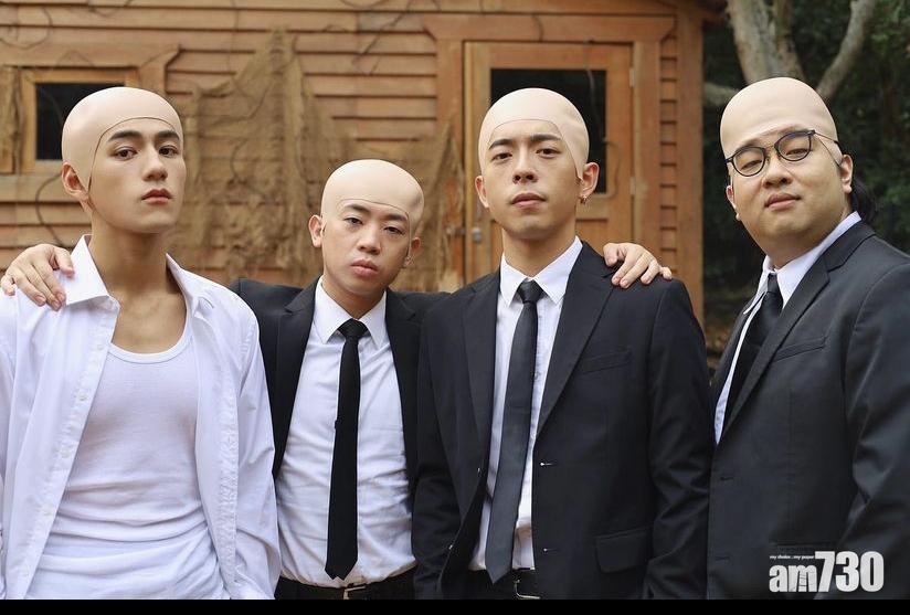 光頭西裝look已是MV裡最正常的造型。