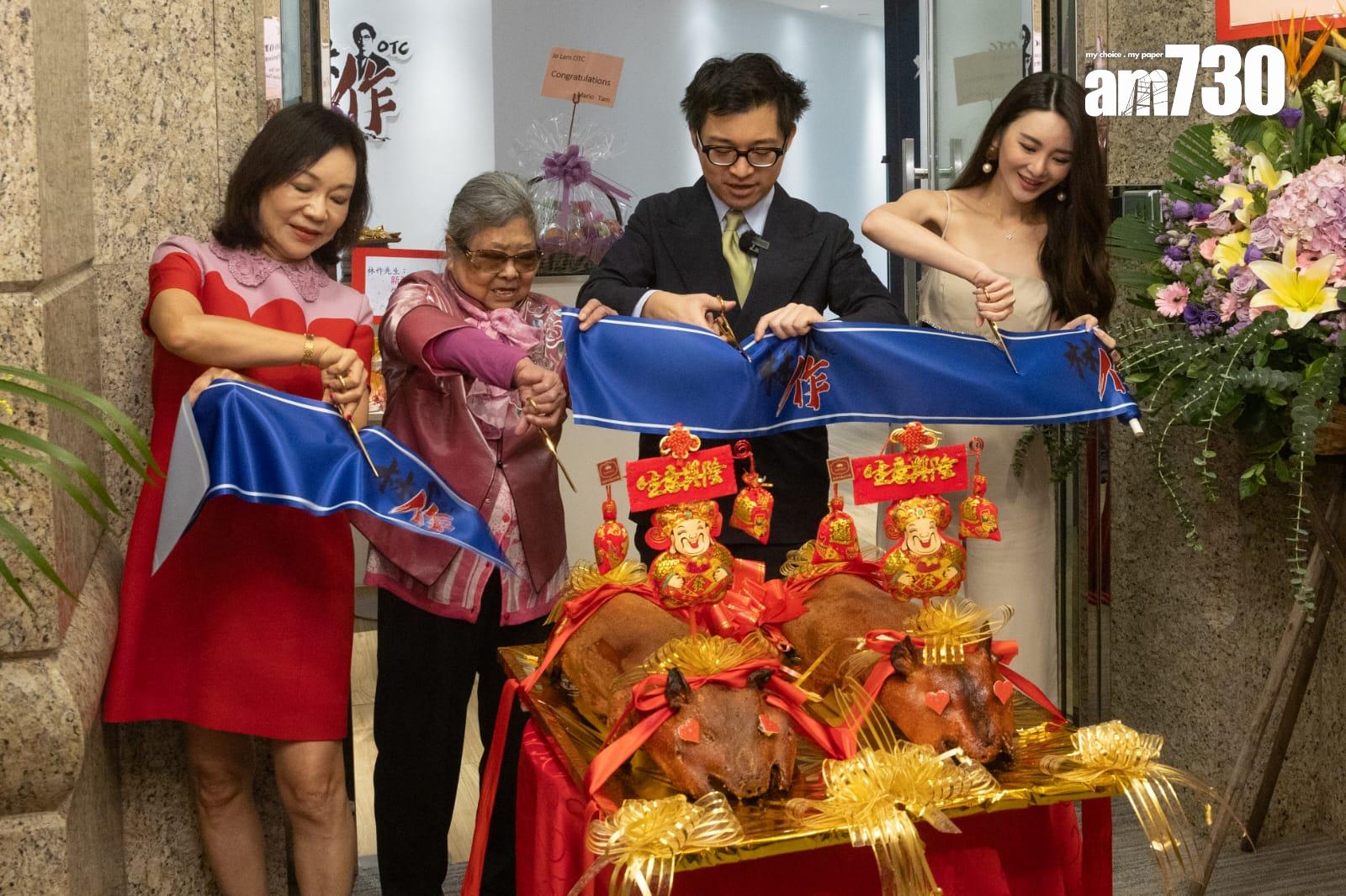 林作三代同堂齊切燒豬。