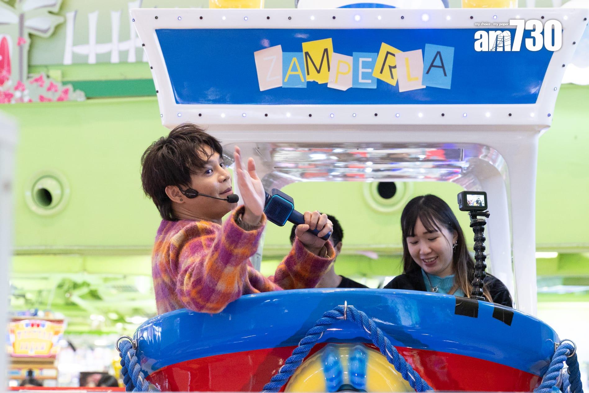 保錡唱住歌與fans玩機動遊戲。(蘇文傑攝)