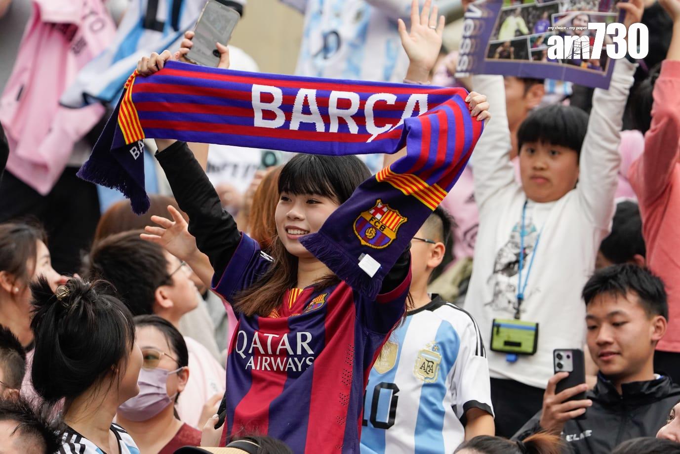 美斯訪香港|球迷戴美斯面具支持偶像 買過千元紀念品認為有助帶動經濟(蘇文傑攝)