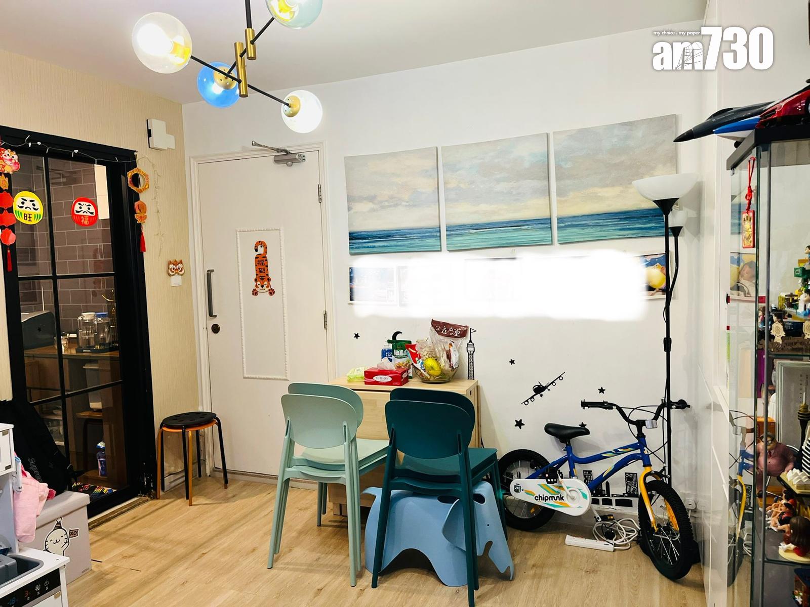 大廳呈長方形開則,廚房採玻璃門設計,增加視覺上的空間感。(代理提供)