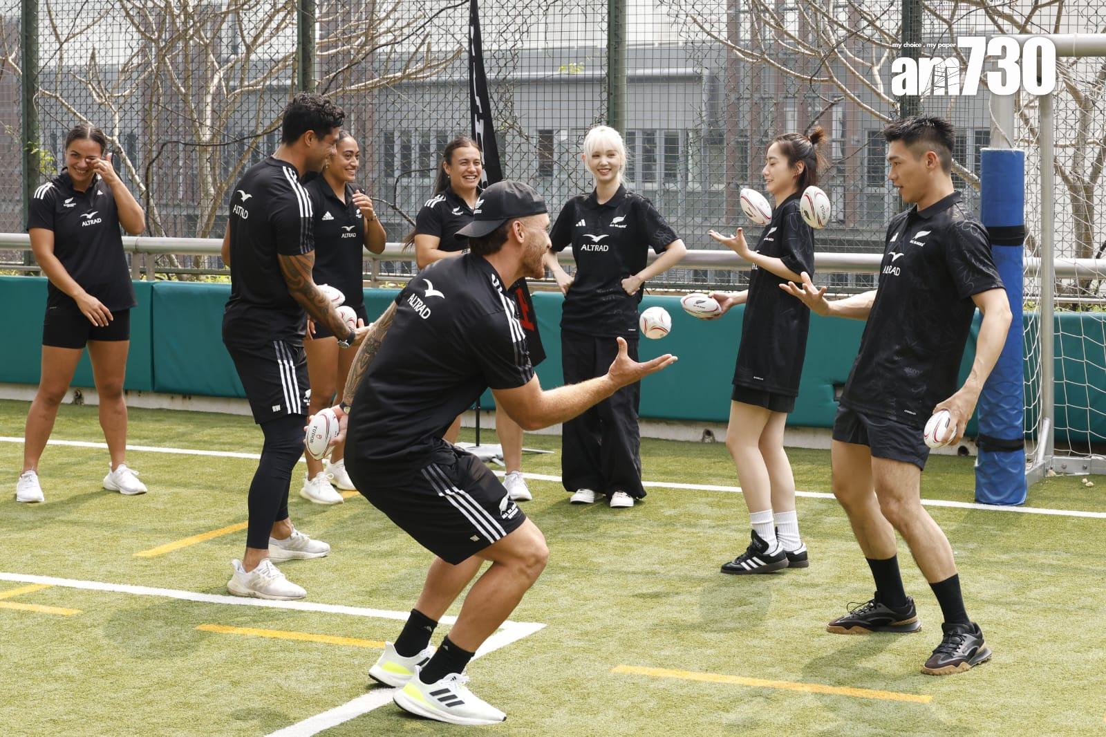 Gigi張蔓姿、Will柯煒林、Nancy歸綽嶢學習基本欖球玩法。 (林俊源攝)