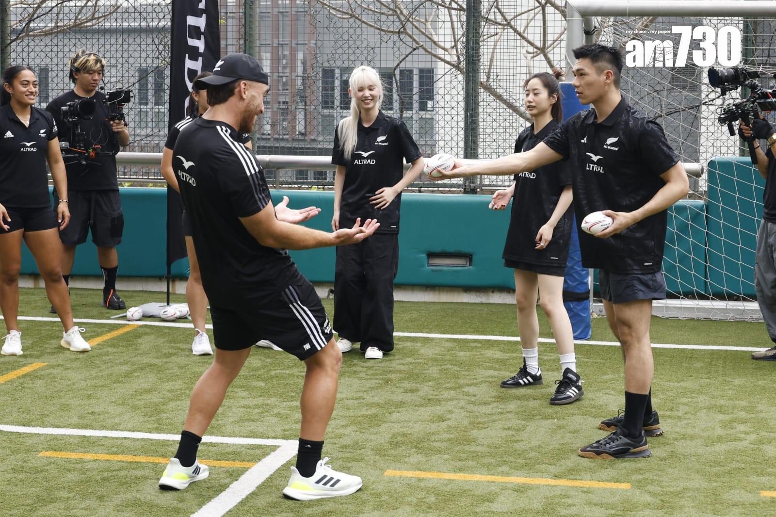 Gigi張蔓姿、Will柯煒林、Nancy歸綽嶢學習基本欖球玩法。 (林俊源攝)