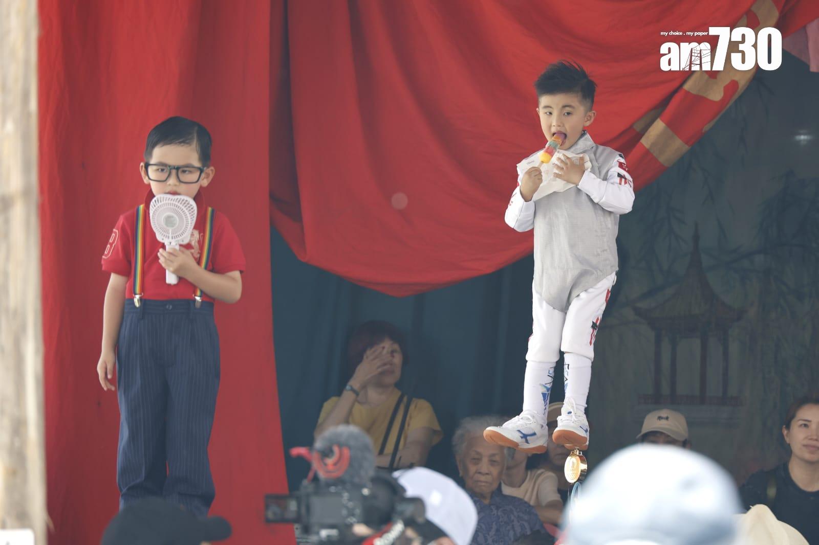 長洲飄色巡遊見到有不少社會熱門人物。(林俊源攝)