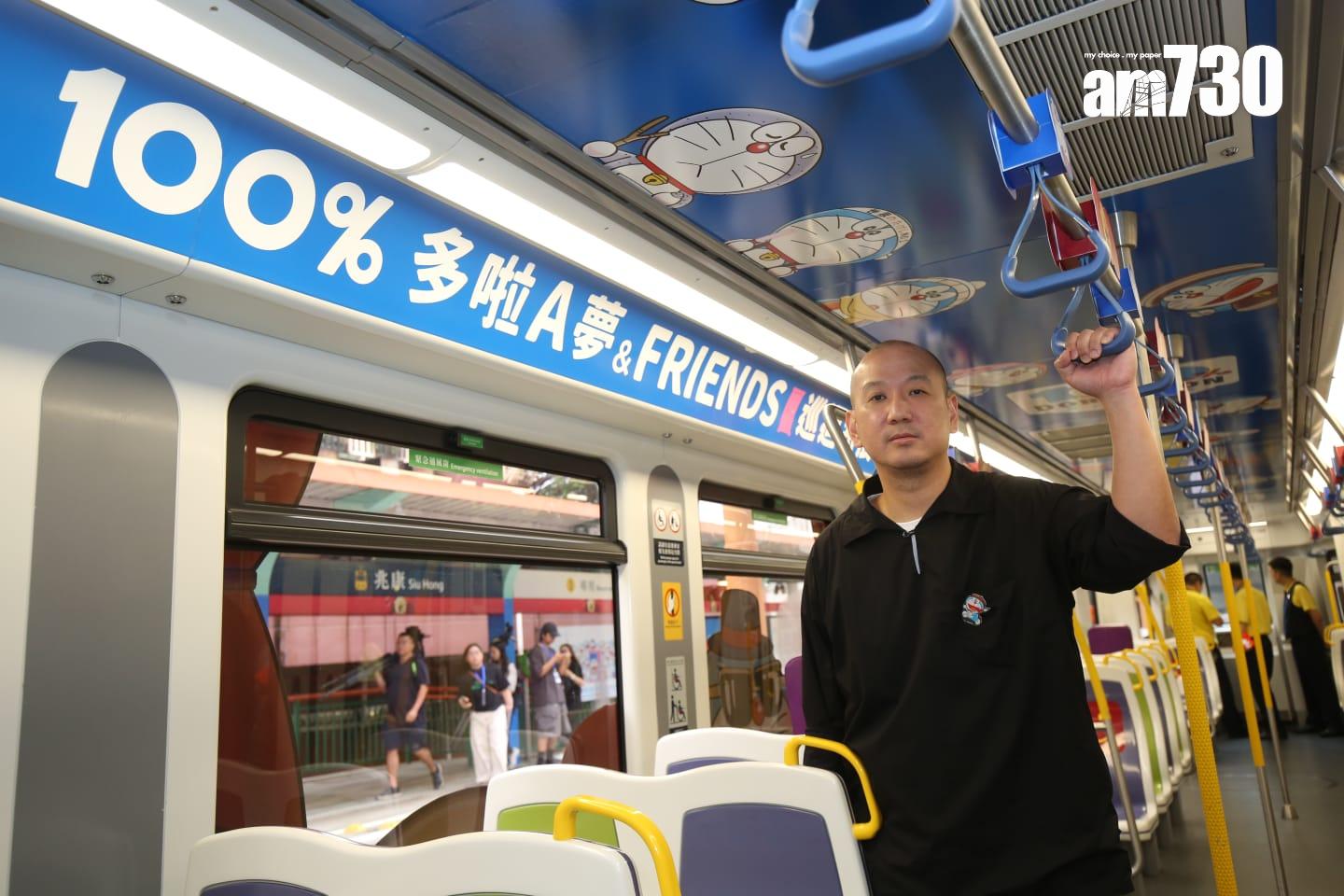 多啦 A 夢主題列車與策展人林樹鑫 (董立華攝)