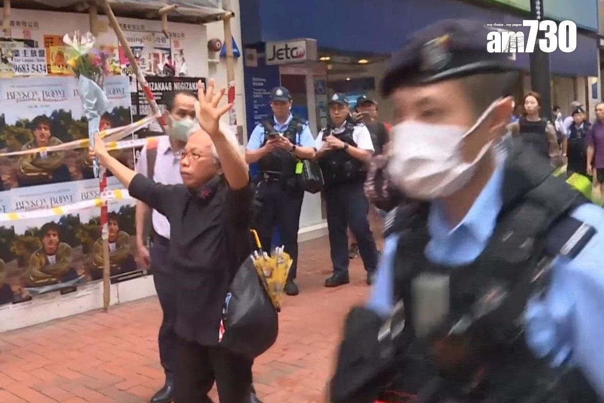 「王婆婆」一度在怡和街舉起鮮花叫口號。(電視截圖)