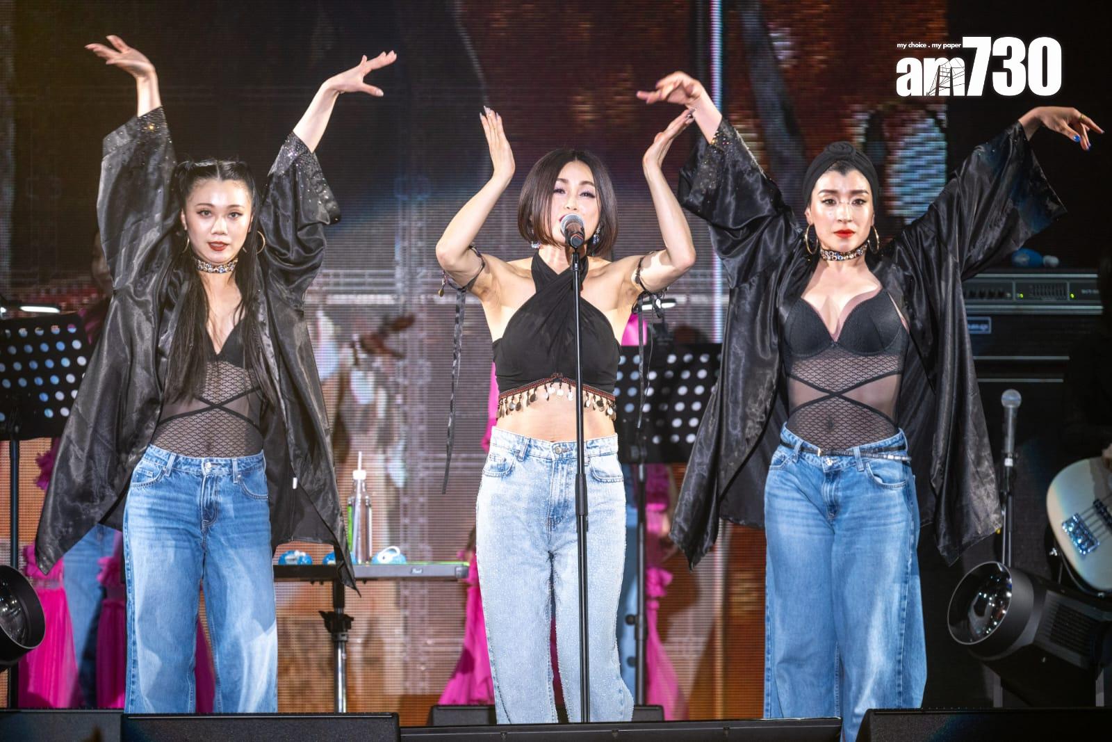 酒井穿上黑色性感上衣,露出香肩及纖腰唱出一連串舊歌。(陳奕釗攝)