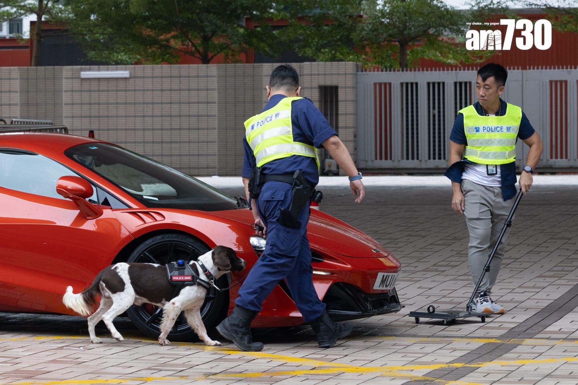 進入法院的車輛需要進行檢查,連名跑亦不例外。(蘇文傑攝)