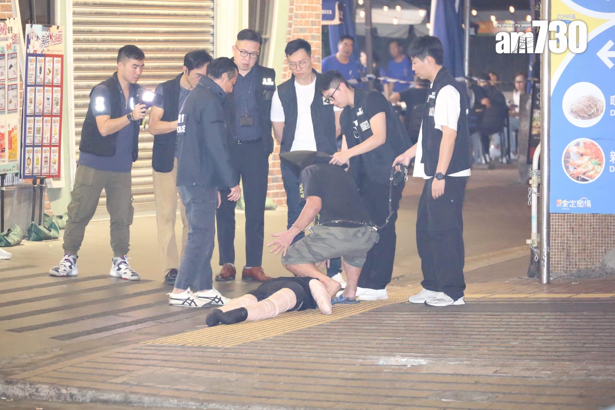 警方帶疑犯回友愛邨重組案情。(鍾式明攝)