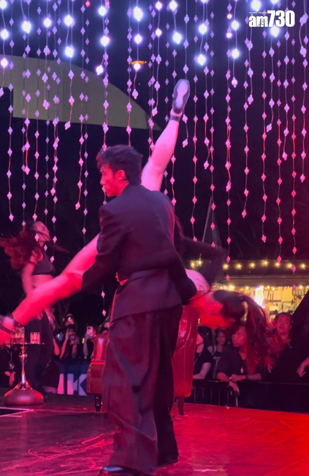 Stanley在西九音樂節的舞蹈表演挑戰高難度動作,抬起再反轉女dancer。(娛樂組攝)