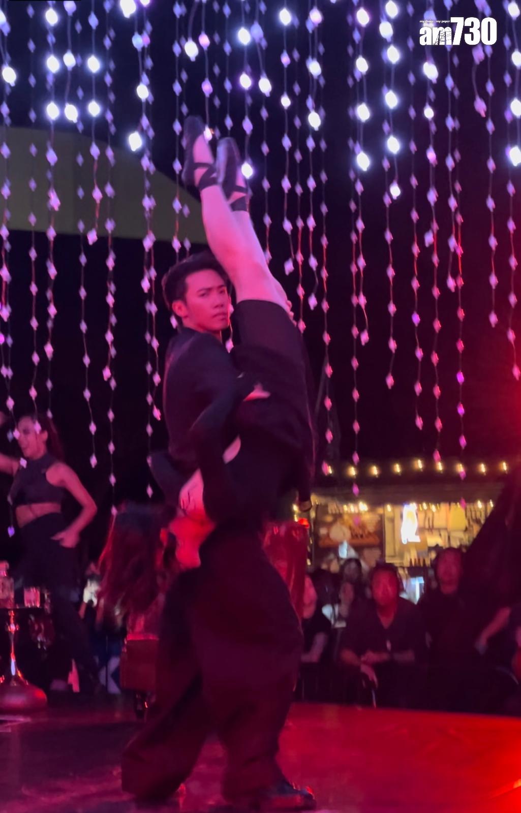 Stanley在西九音樂節的舞蹈表演挑戰高難度動作,抬起再反轉女dancer。(娛樂組攝)