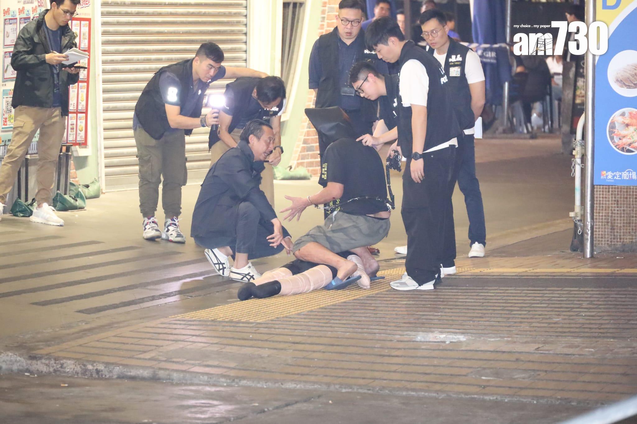 警方帶疑犯回友愛邨重組案情。(鍾式明攝)