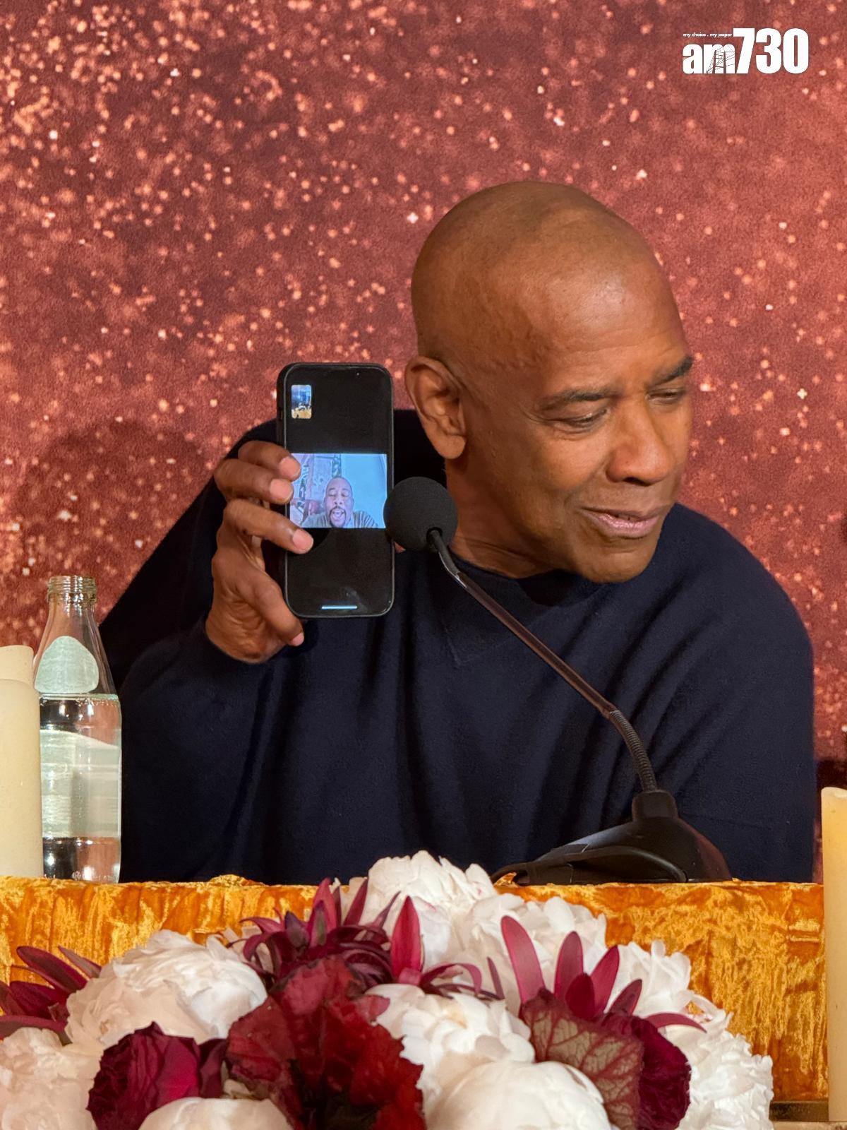 原來是丹素華盛頓下一部作品舞台劇監製致電。 (Lilly Lui攝)