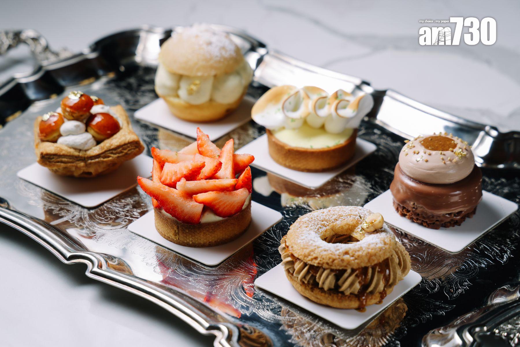 法式經典甜品有榛子醬巴黎泡芙圈、聖特羅佩泡芙、聖多諾黑泡芙、草莓撻等。(吳康琦攝)