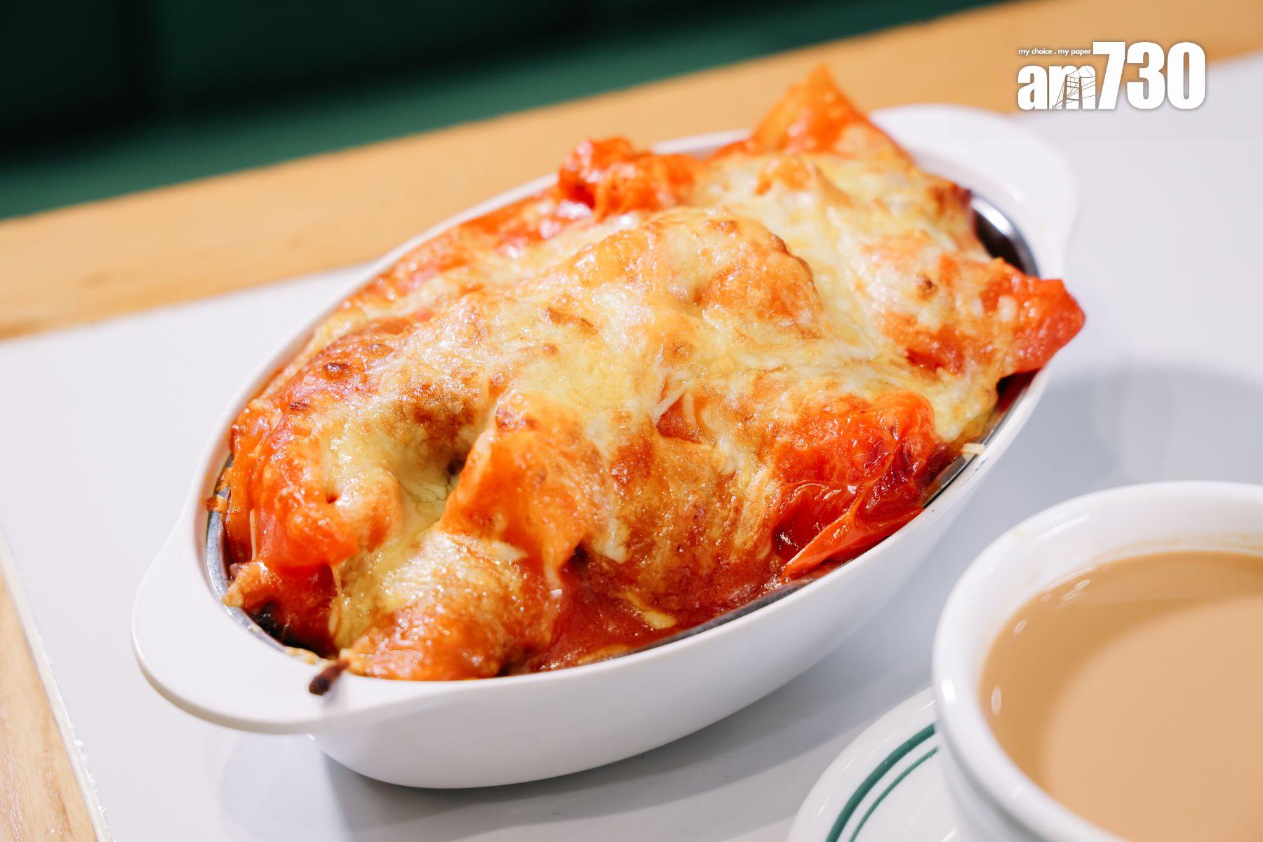 鮮茄焗菠蘿豬扒飯$68 豬扒鬆軟,粒粒菠蘿酸甜多汁刺激胃口。