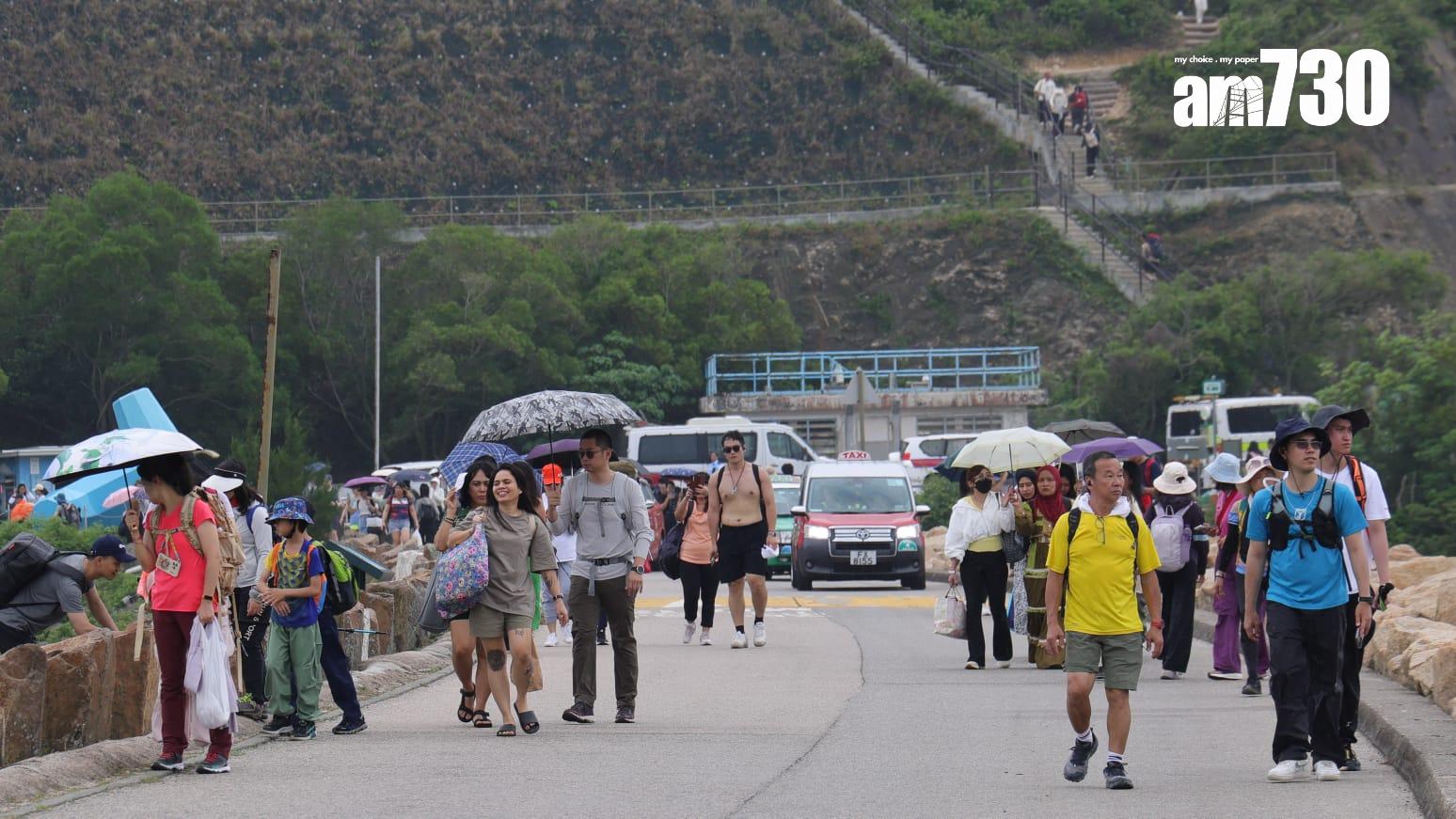 萬宜水庫東壩成為旅客深度遊的熱門地點。(吳康琦攝)
