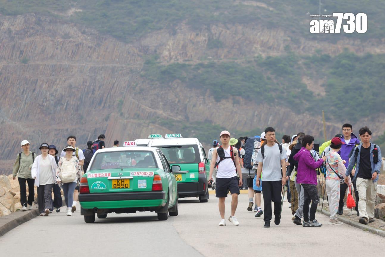 萬宜水庫東壩成為旅客深度遊的熱門地點。(吳康琦攝)