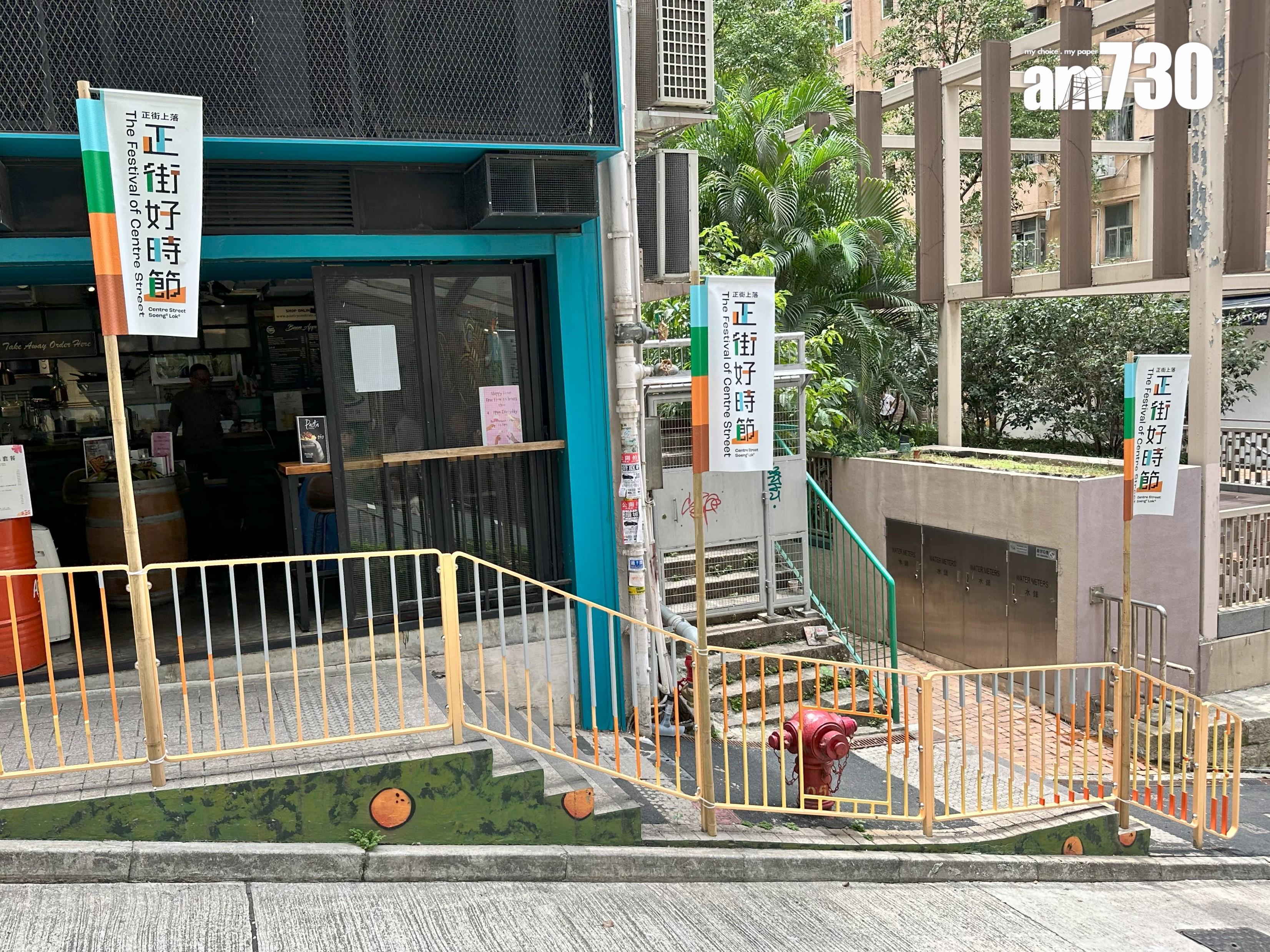 橙的壁畫會一直沿著樓梯掉到街尾。(陳穎琳攝)