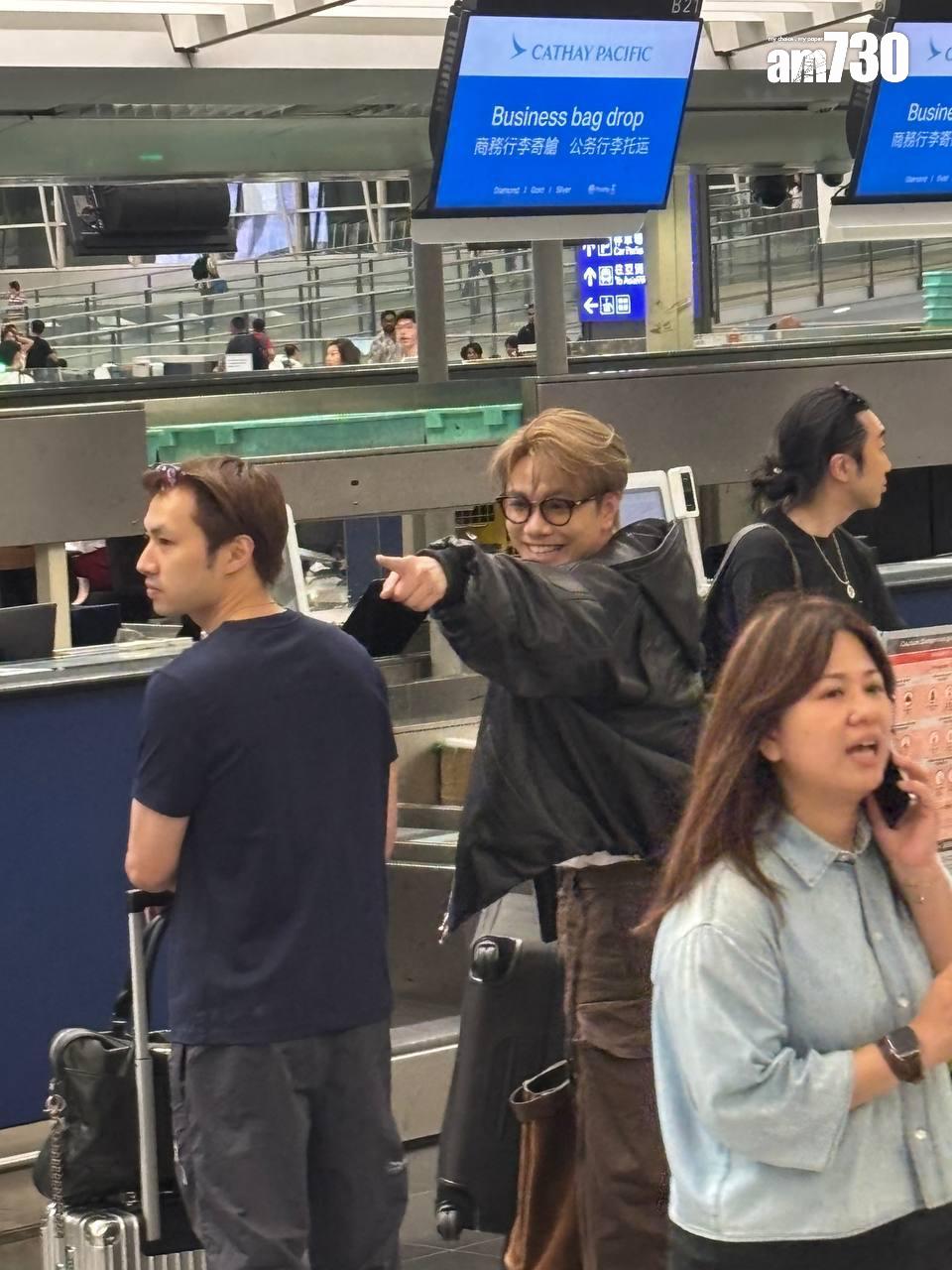 張敬軒與Tyson Yoshi同一班機。 (娛樂組攝)