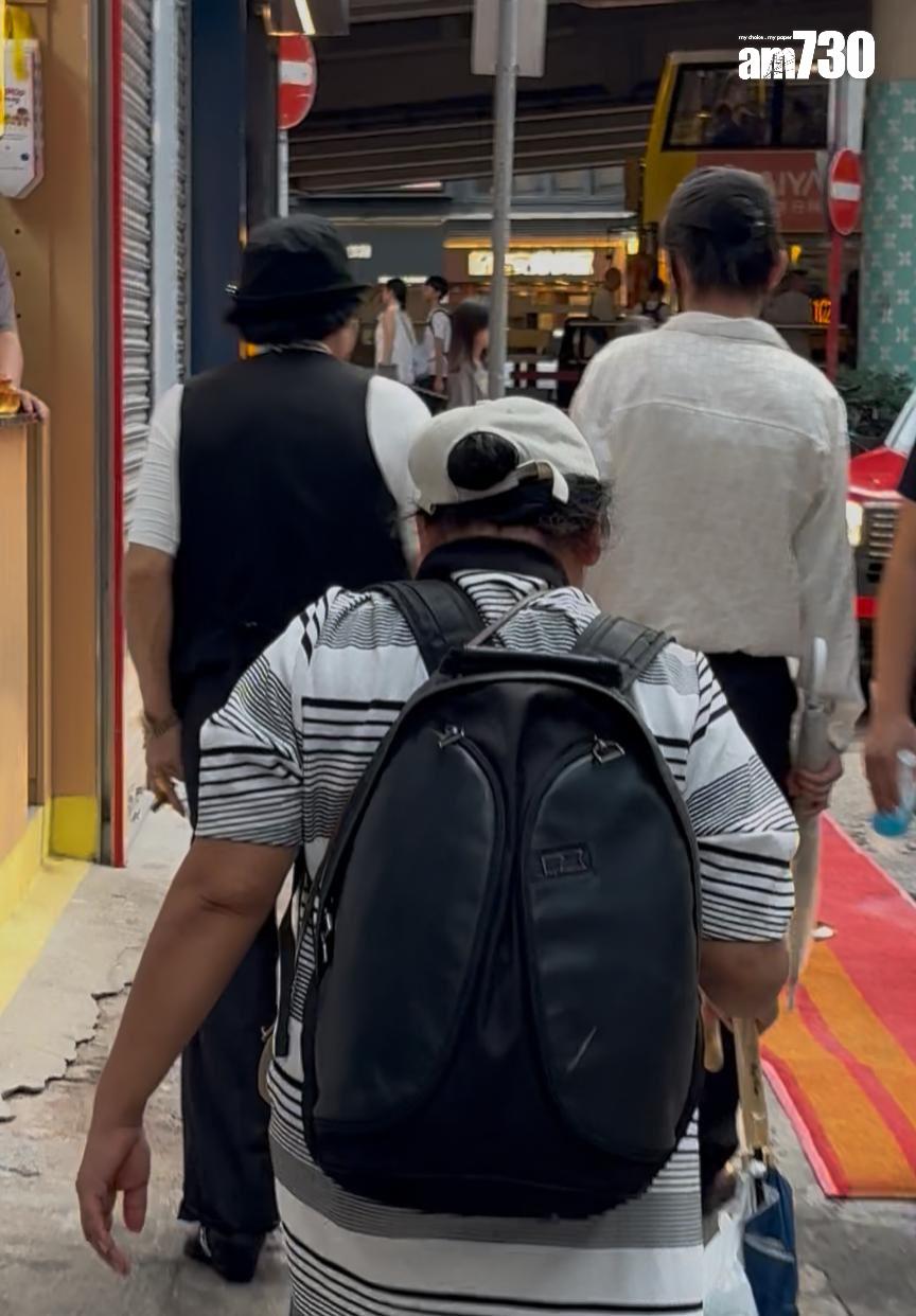 近年變得低調的八両金父子,昨日現身鬧市。 (娛樂組攝)