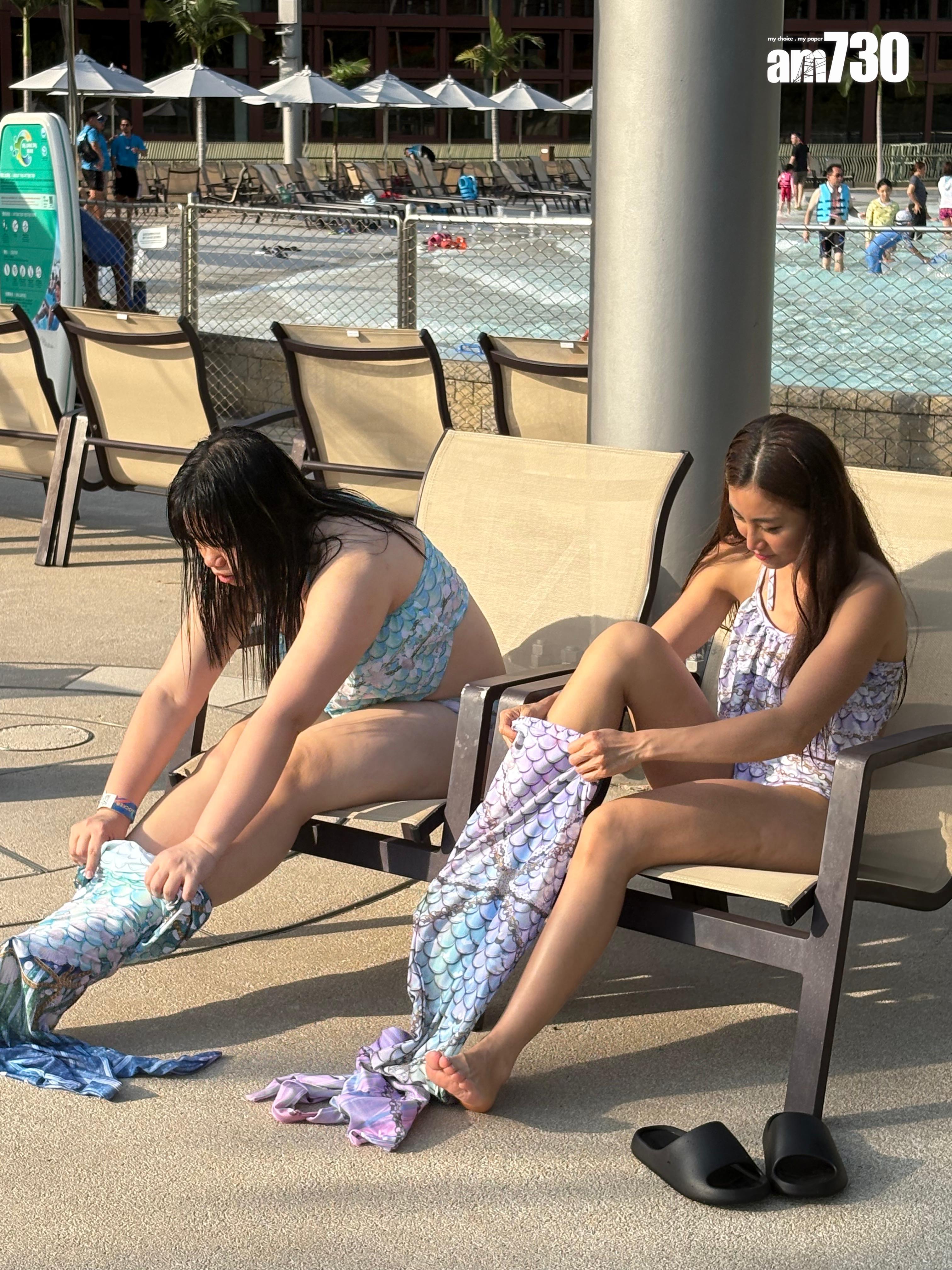 阿儀被直擊孖黃榕即場換美人魚泳衣裝束。(娛樂組攝)