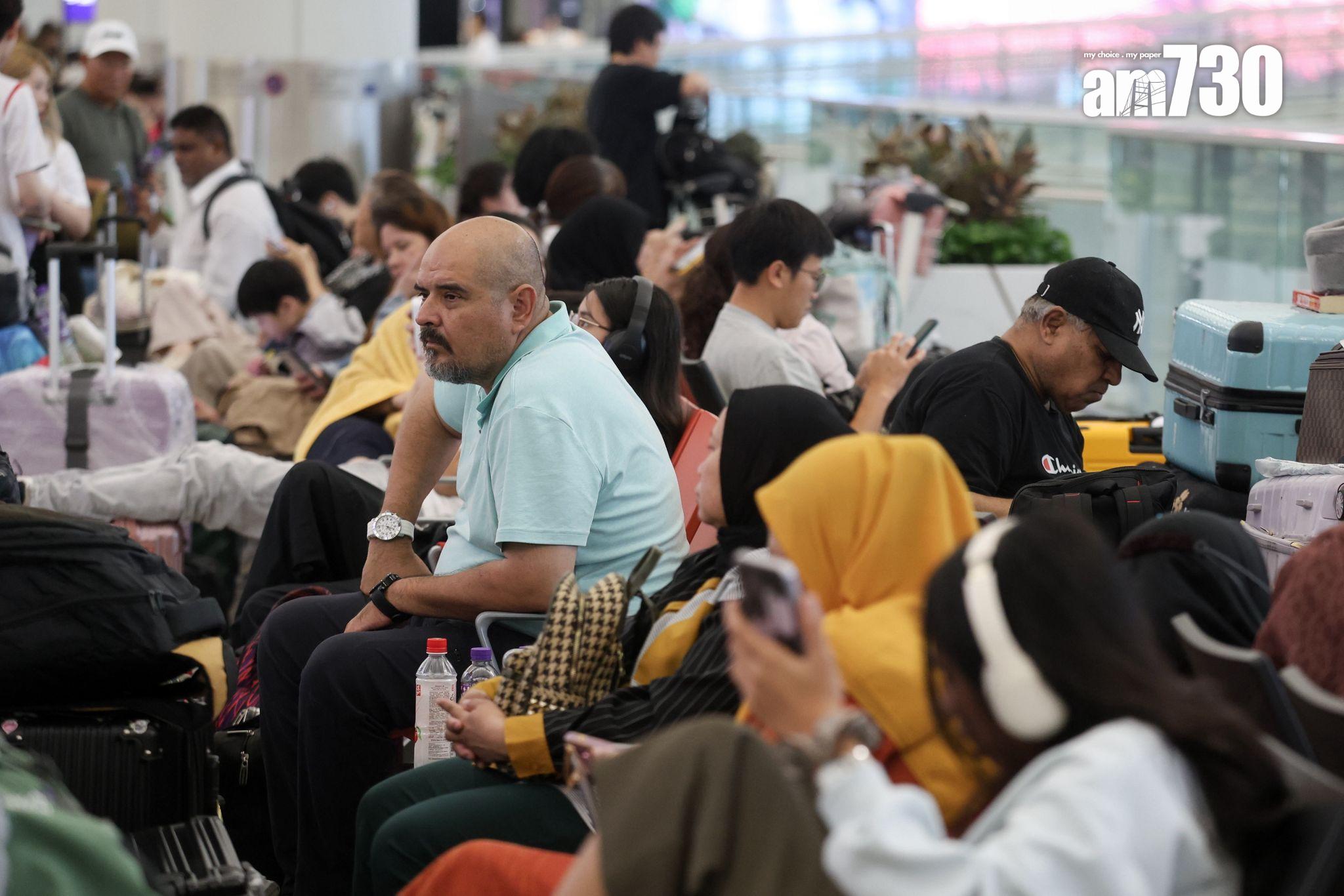 機場7點左右,人流比平常多。(周令知攝)