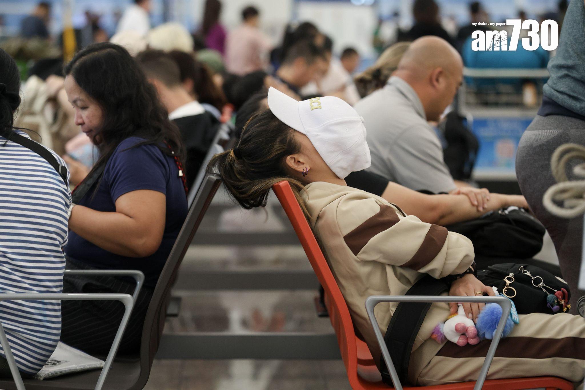 機場7點左右,人流比平常多。(周令知攝)