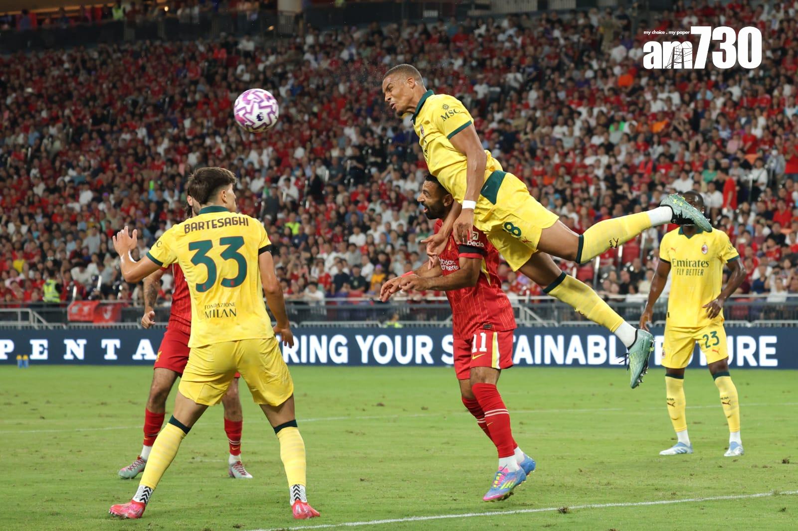 米蘭的馬歷泰奧頭槌解圍。(林俊源攝)