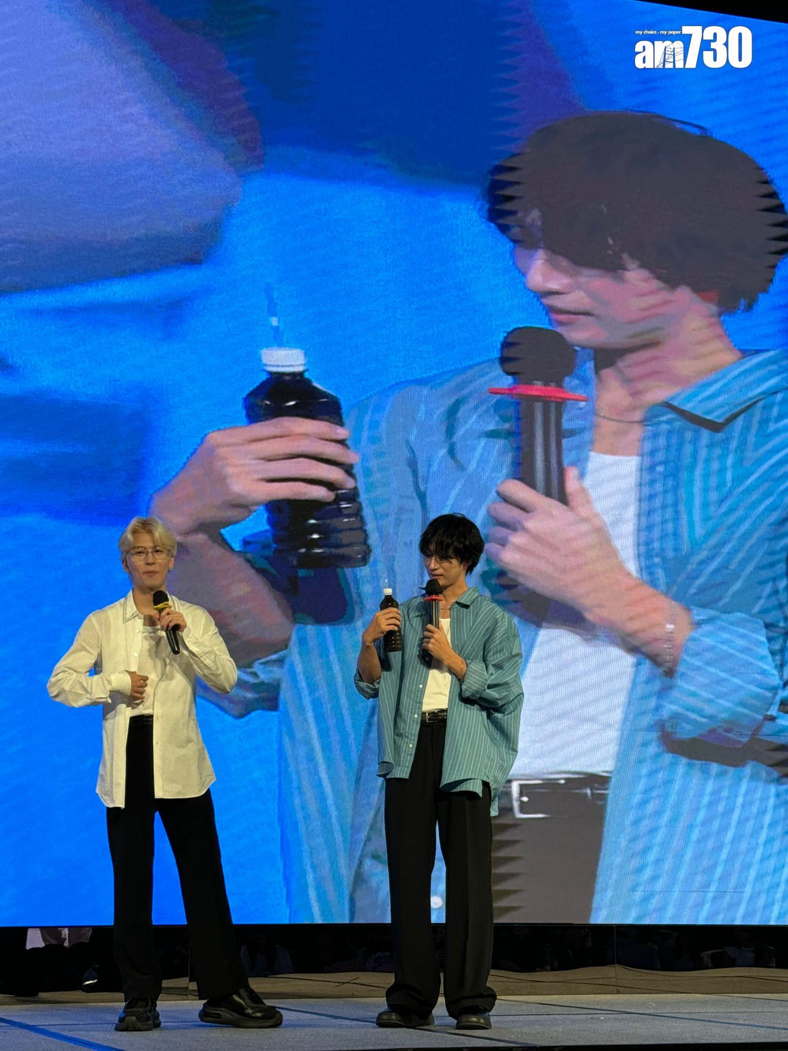 兩人遊戲結束後,挑戰廿四味飲到面容扭曲。 (娛樂組攝)