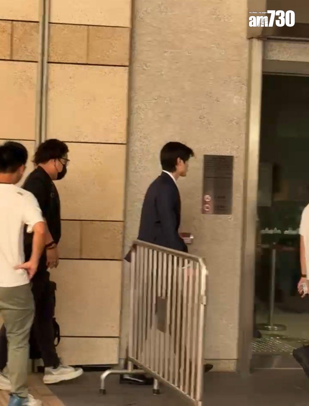 上村謙信今午現身法院。 (娛樂組攝)