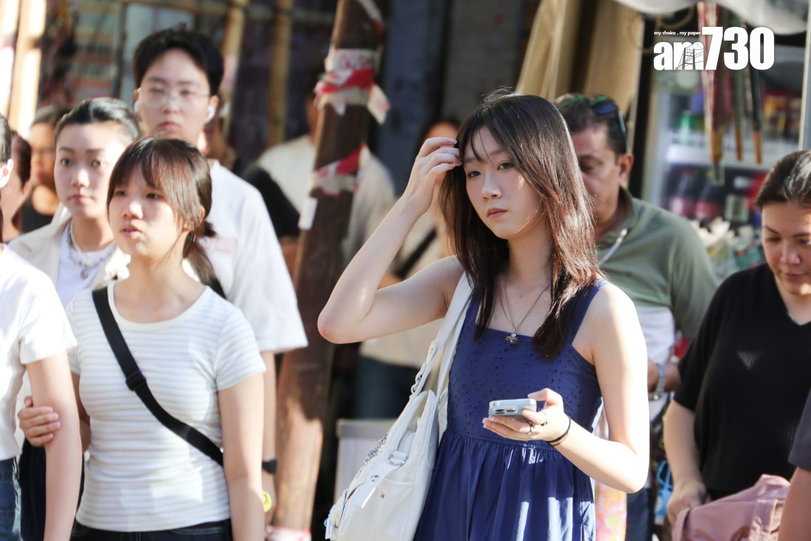 明日最高氣溫約32度。(吳康琦攝)