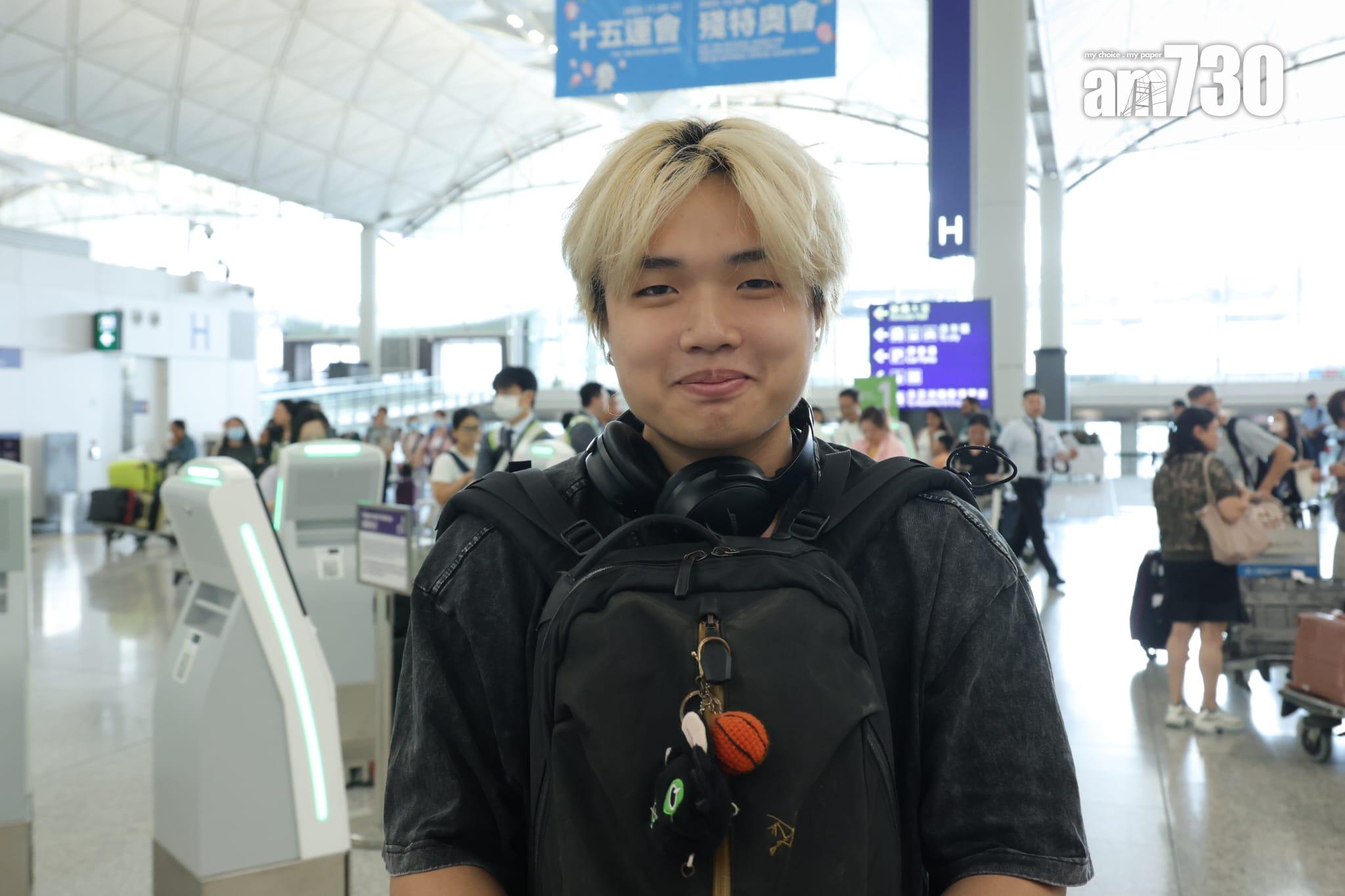 準備飛往台北的鄺先生表示行程沒有特別受影響。(林俊源攝)