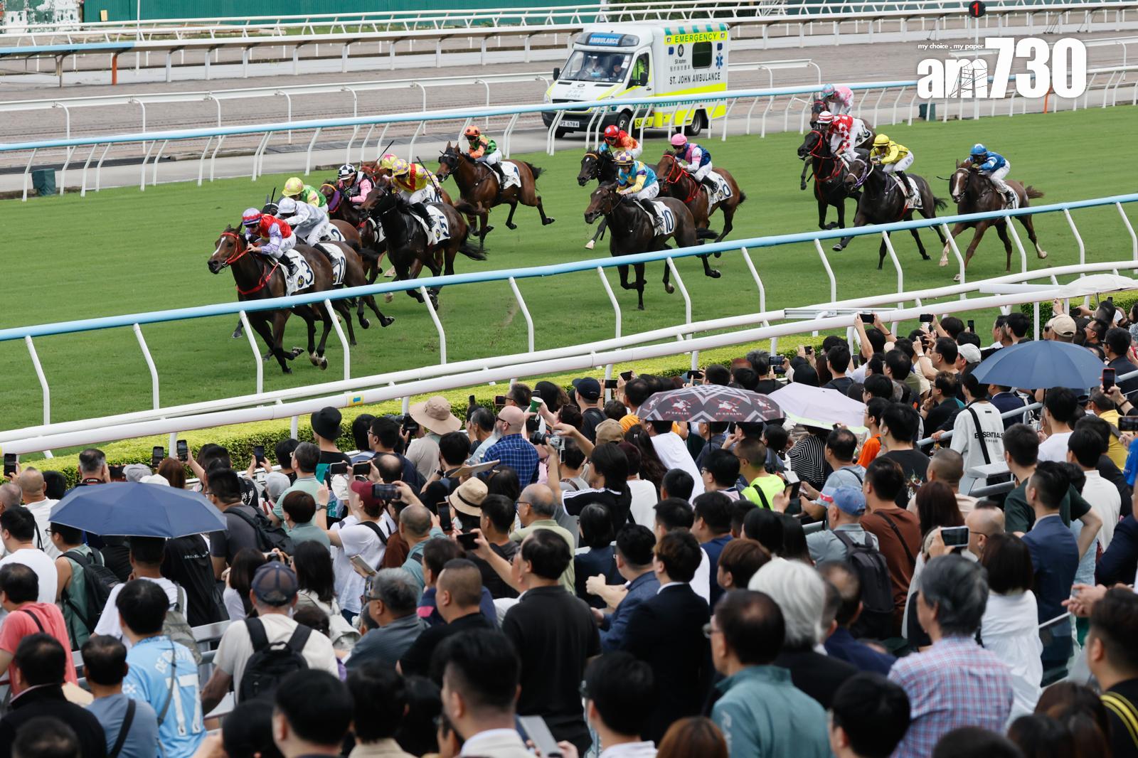 馬會今日開鑼 打風無阻馬迷熱情 (蘇文傑攝)