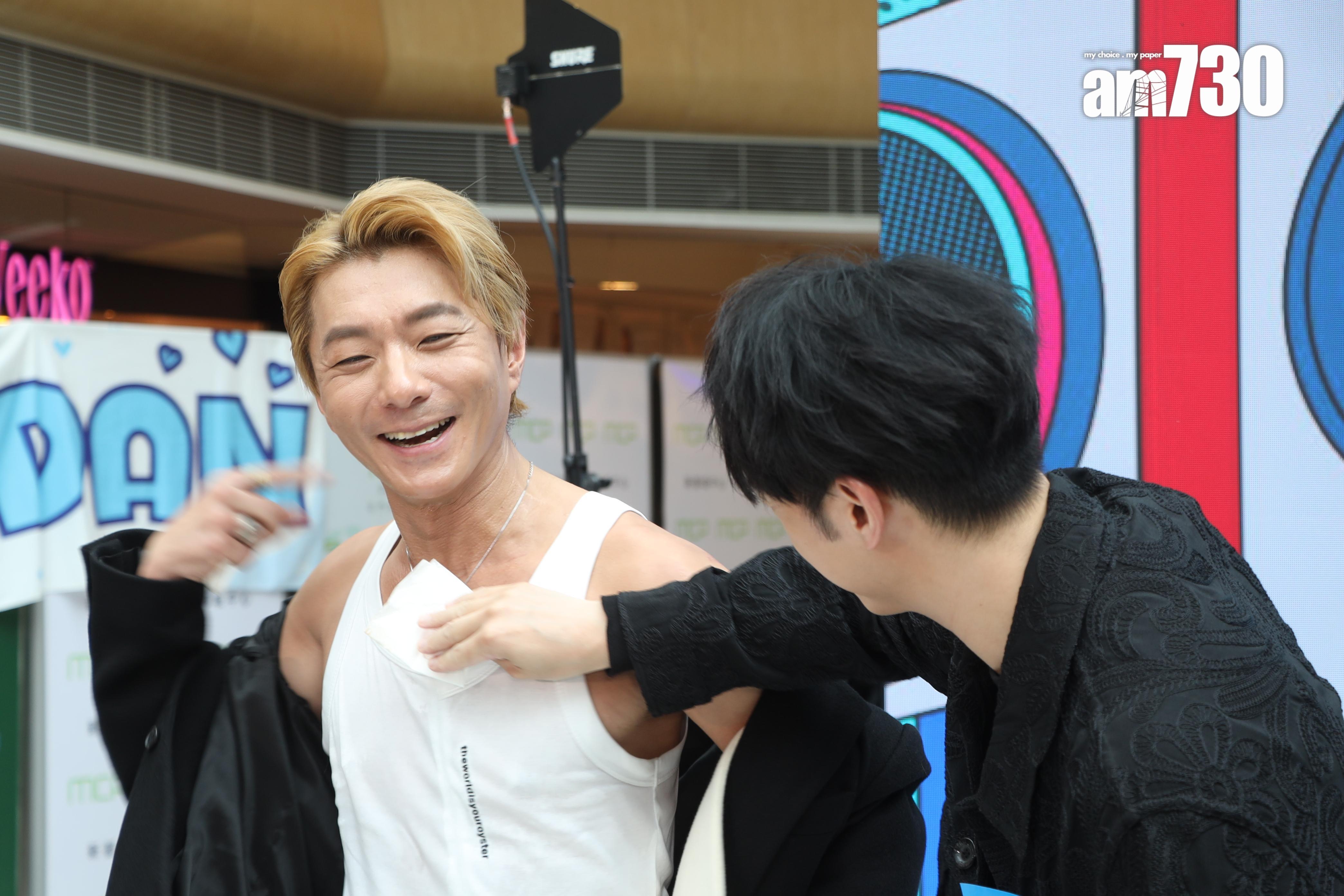 周國賢熱得頭大汗,掀起外套,馮允謙貼心地為他抺汗。(娛樂組攝)