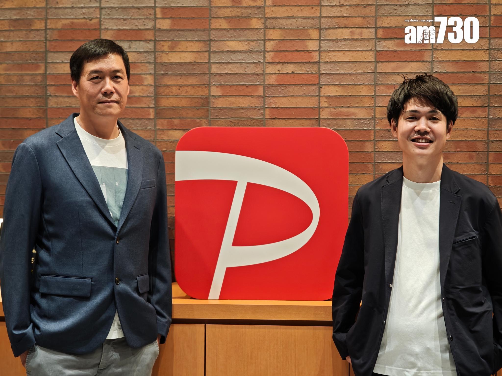 八達通零售業務及合作夥伴總經理黎家聰(左)與PayPay代表高原先生(右)來到日本PayPay辦公室解說今次合作。