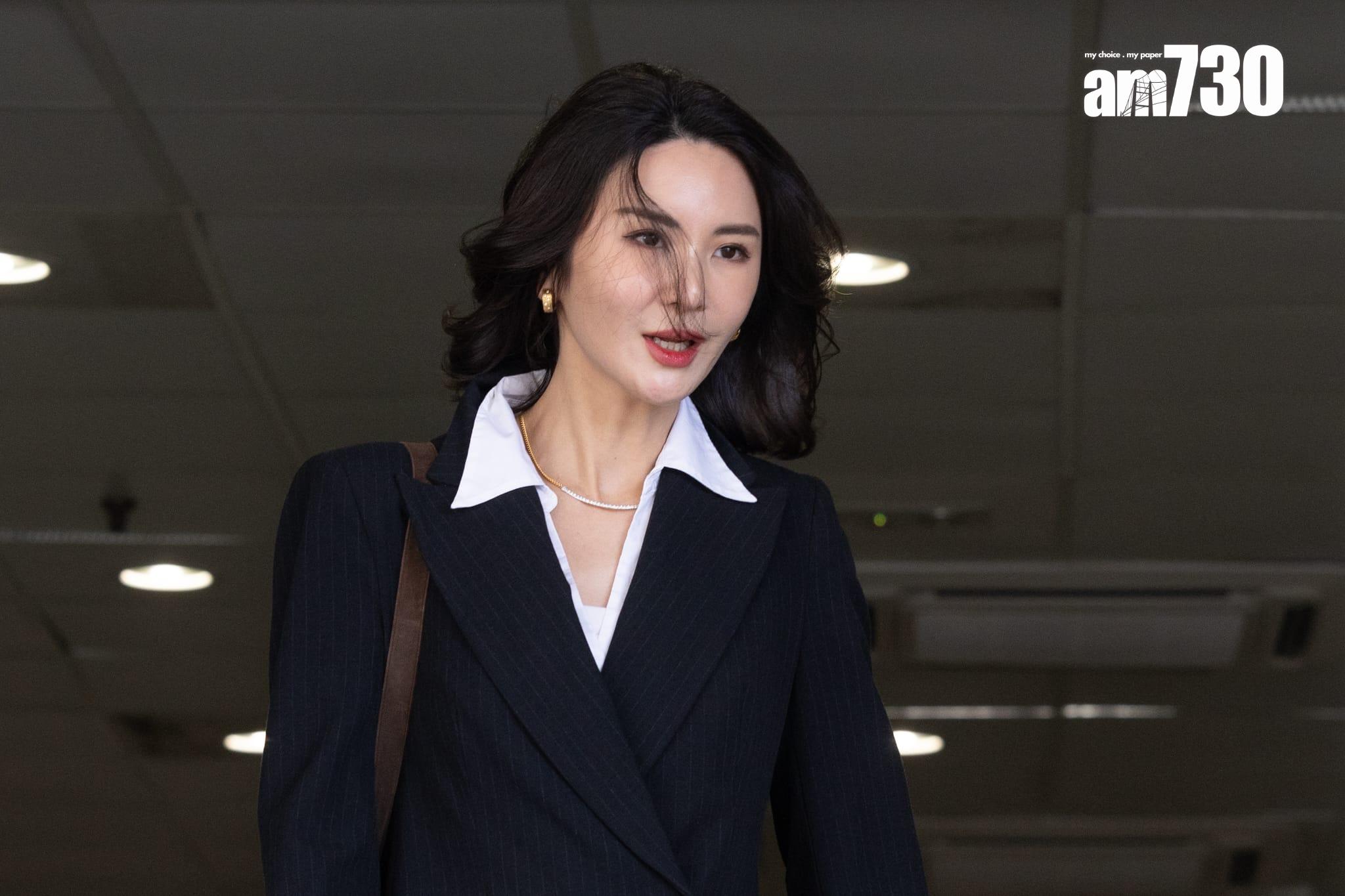 JPEX虛擬貨幣詐騙案,林作等人由警車押送至東區裁判法院,林作女友裕美離開法庭(蘇文傑攝)