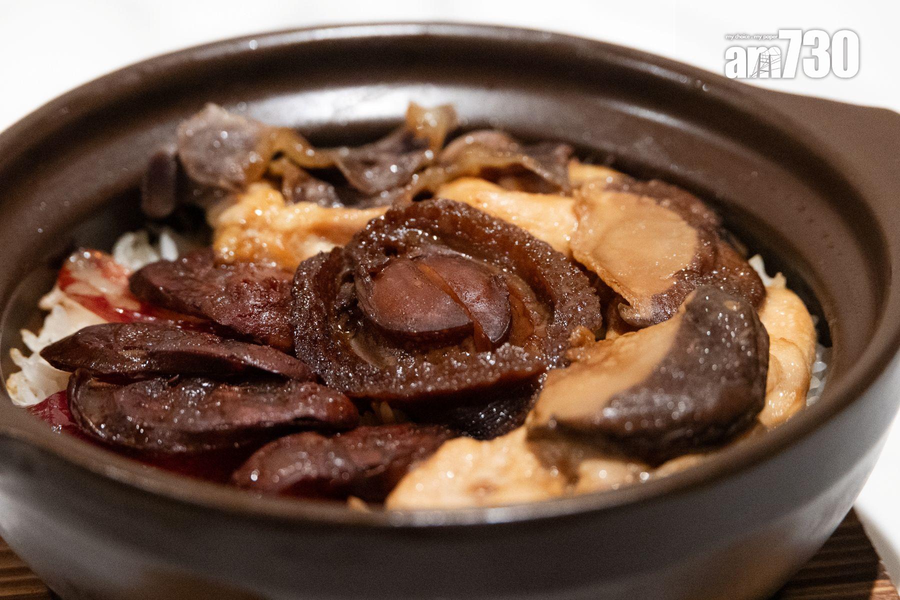 麗姐海陸空煲仔飯($198)有齊鮑魚、去骨滑雞及臘味,吃出飯香。(周令知攝)