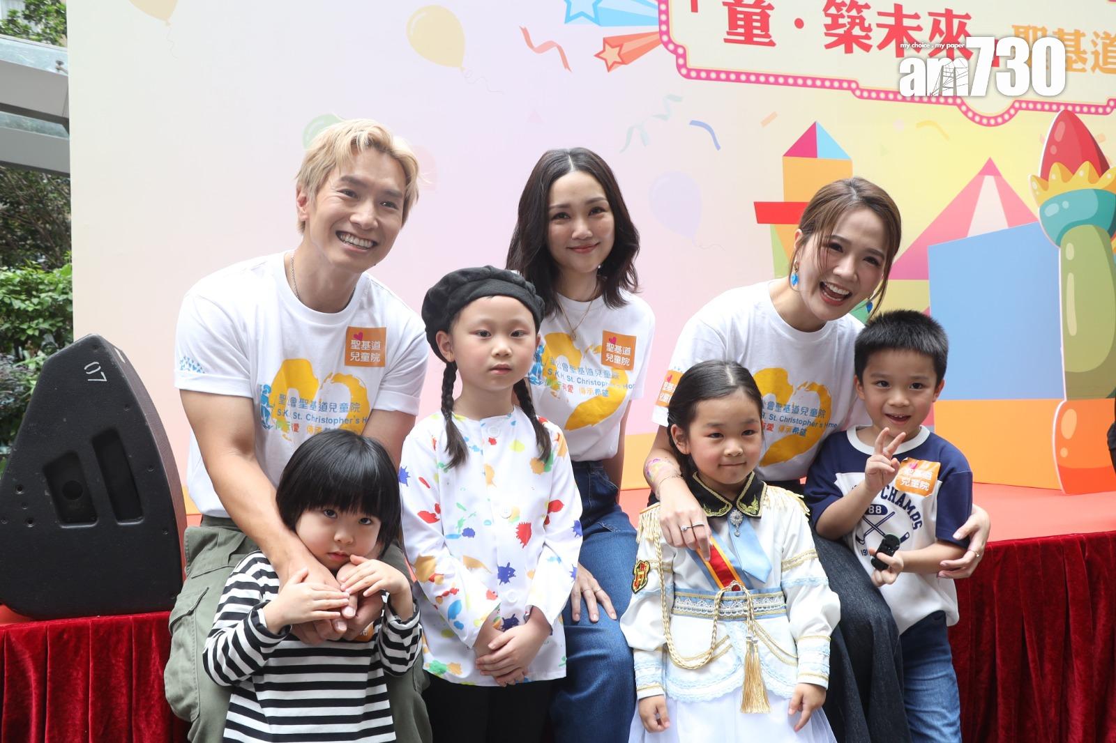 謝安琪與陳柏宇開心與兒童院小朋友合照。(娛樂組攝)