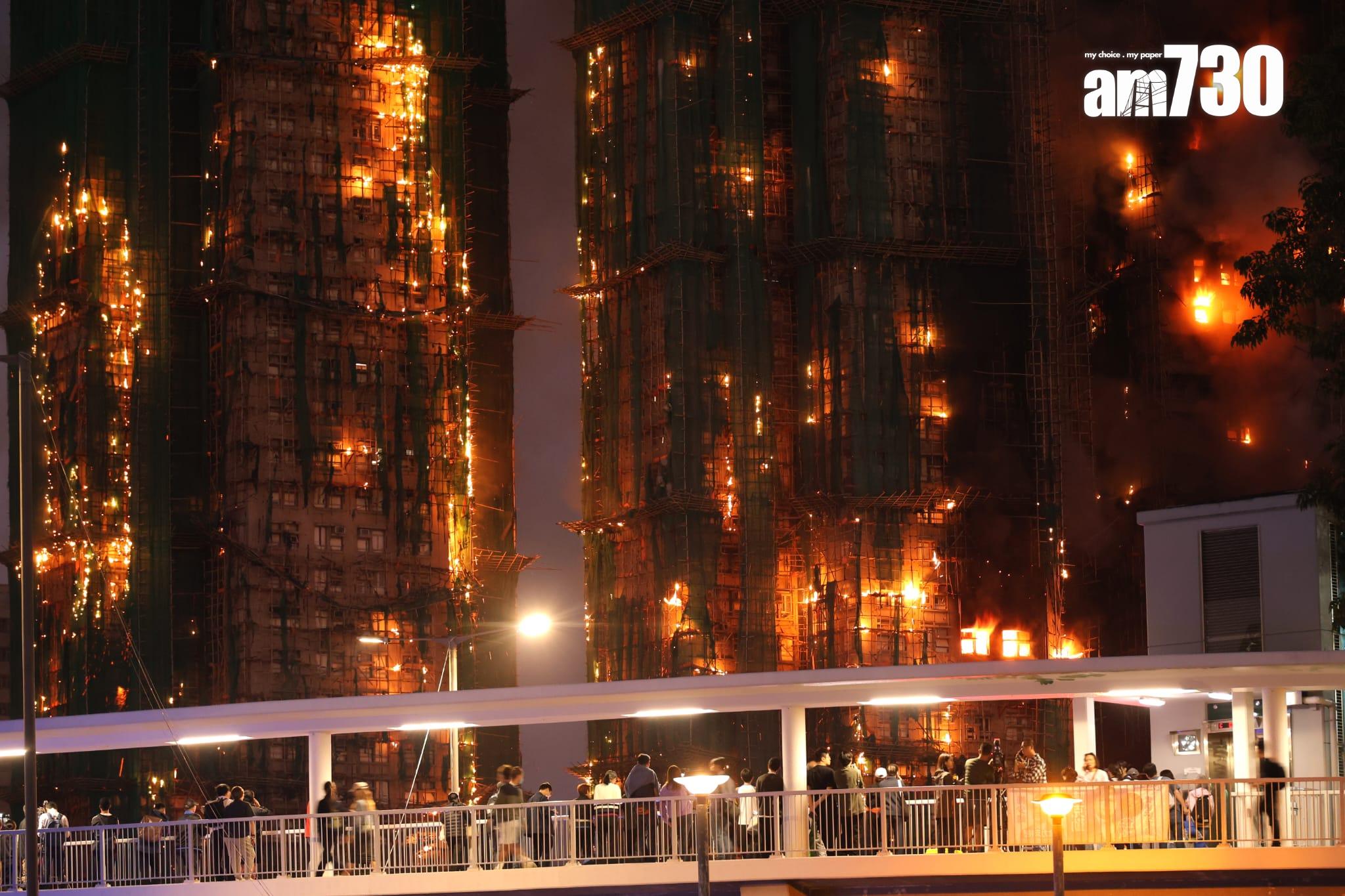 大埔宏福苑宏昌閣外牆棚架起火,消防將火警升為五級。 (林俊源攝)