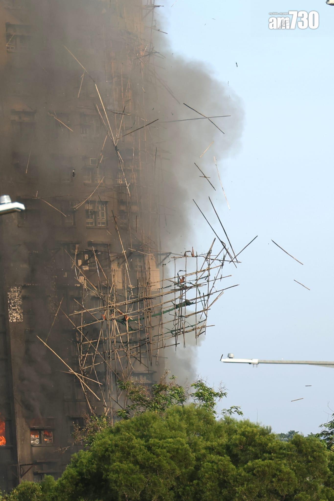 大埔宏福苑宏昌閣外牆棚架起火,消防將火警升為四級。 (林俊源攝)