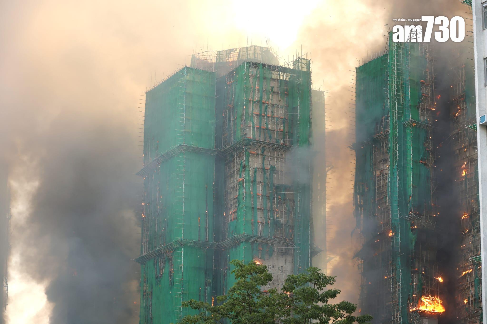 大埔宏福苑宏昌閣外牆棚架起火,消防將火警升為四級。 (林俊源攝)