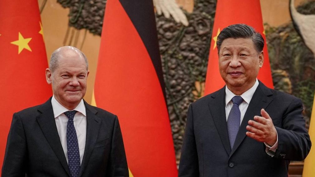習近平會見肖爾茨，籲中德攜手合作。(路透社)